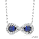 4X3 MM Pear Shape Sapphire and 1/10 Ctw Round Cut Diamond Precious Infinite Halo Pendant With Chain in 10K White Gold