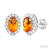 5x3 MM Oval Shape Citrine and 1/8 Ctw Round Cut Diamond Halo Semi-Precious Stud Earrings in 10K White Gold