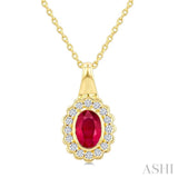 6X4 MM Oval Shape Ruby and 1/6 Ctw Round Cut Diamond Bold Precious Pendant With Chain in 10K Yellow Gold