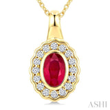 6X4 MM Oval Shape Ruby and 1/6 Ctw Round Cut Diamond Bold Precious Pendant With Chain in 10K Yellow Gold