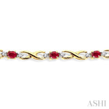 4x3 MM Oval Cut Ruby and 1/10 Ctw Single Cut Diamond Bracelet in 10K Yellow Gold