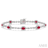 5x3 MM Oval Cut Ruby and 1/20 Ctw Single Cut Diamond Bracelet in 10K White Gold