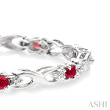 4x3 MM Oval Cut Ruby and 1/10 ctw Single Cut Diamond Bracelet in 10K White Gold