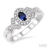 5x3 MM Oval Cut Sapphire and 1/50 ctw Single Cut Diamond Ring in Sterling Silver