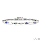 5x3 MM Oval Cut Tanzanite and 1/10 ctw Bar and Oval Mount Round Cut Diamond  Precious Bracelet in 10K White Gold