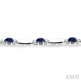 1/10 Ctw Bar and Oval Mount Round Cut Diamond & 5x3 MM Oval Cut Sapphire Precious Bracelet in 10K White Gold