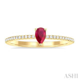 5x3 MM Pear Cut Ruby and 1/10 ctw Petite Round Cut Diamond Precious Fashion Ring in 10K Yellow Gold