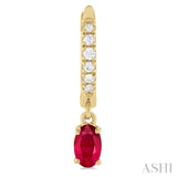 5x3 MM Oval Cut Ruby and 1/8 ctw Petite Round Cut Diamond Precious Fashion Huggies in 10K Yellow Gold