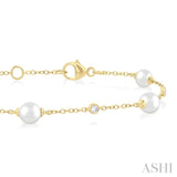 1/6 Ctw 5 MM Cultured Pearl and Round Cut Diamond Fashion Station Bracelet in 14K Yellow Gold