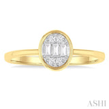 1/6 ctw Petite Bezel Set Oval Shape Fusion Baguette and Round Cut Diamond Fashion Ring in 10K Yellow Gold