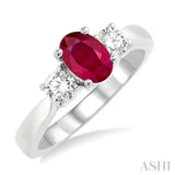 7X5mm Oval Shape Ruby and 1/2 Ctw Round Cut Diamond Ring in 14K White Gold